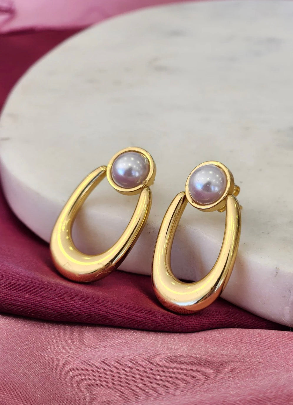 Aretes ovalados con perla