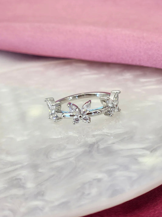 Anillo plateado tres mariposas
